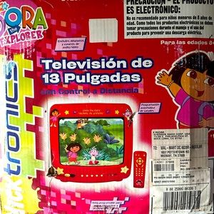 Vintage Dora tv includes the original box, remote, wires, and even manual.